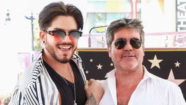 Adam Lambert, Simon Cowell. Getty Images
