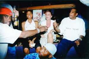 Angie Martinez (2nd from r.) with a young Jay Z (r.) and Diddy (l.)